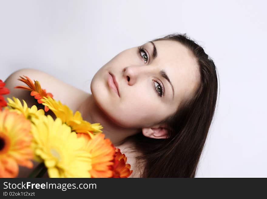 Beautiful girls with gerberas