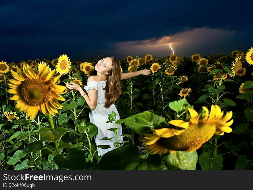 Woman inside sunflowers field