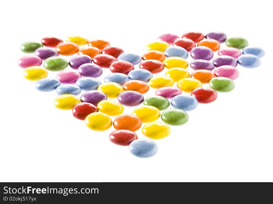 Heart made of colourful sweet candies. Heart made of colourful sweet candies