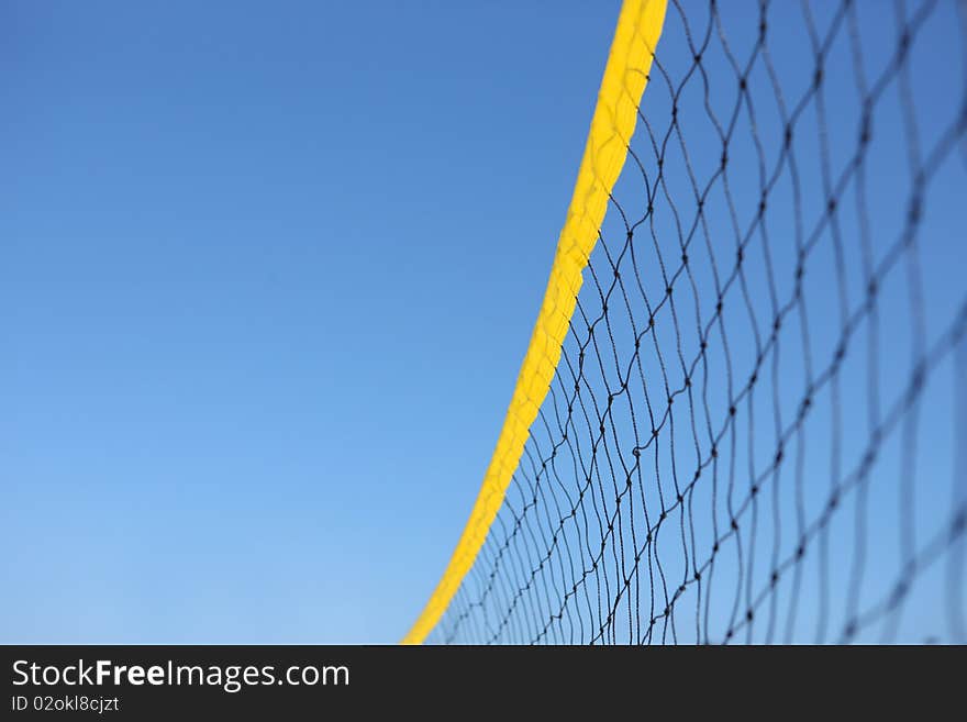 Detail of beach volley net wit a blue sky