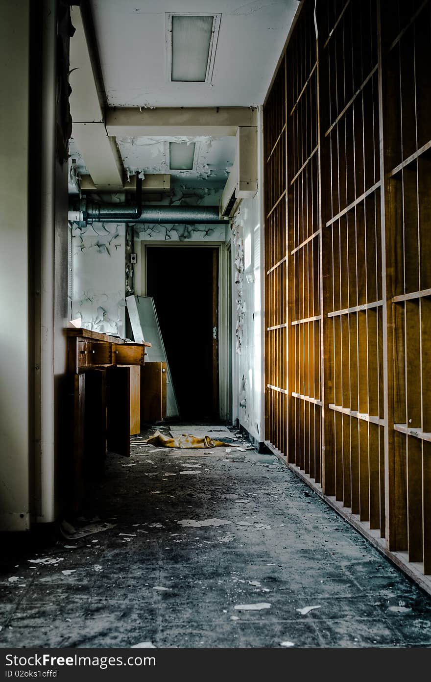 Image of an old derelict abandoned building with destroyed shelving and rotting walls. Image of an old derelict abandoned building with destroyed shelving and rotting walls.