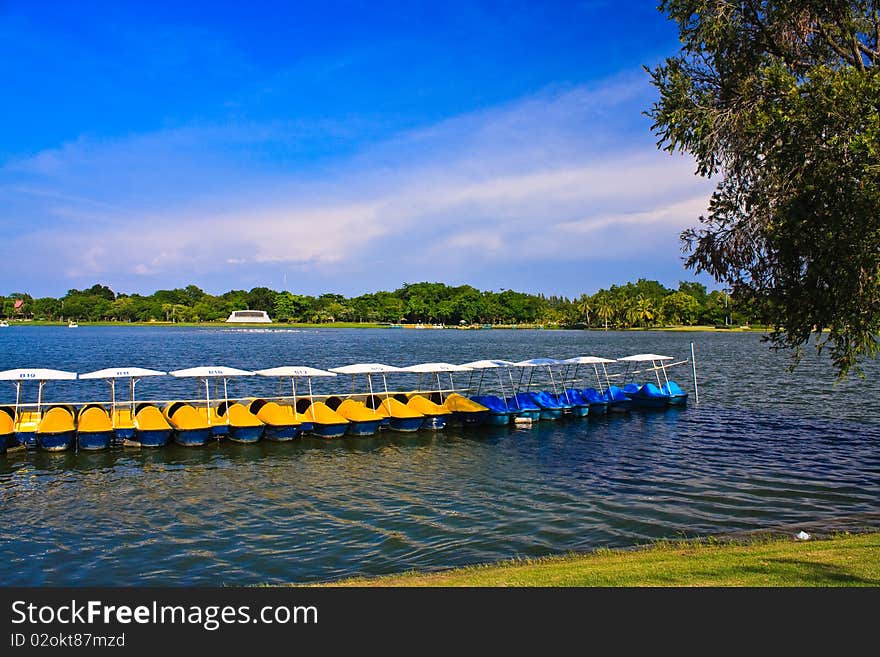 Colorful pedal boat for rent in lake. Colorful pedal boat for rent in lake