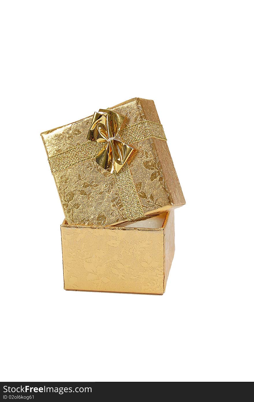 Golden gift box with a bow on white background. Isolated with path