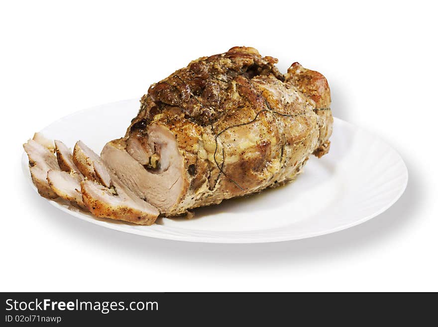 The pork fried in an oven, isolated on a white background