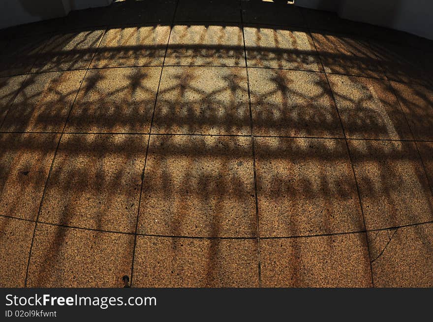 Shadow of old gate on the floors