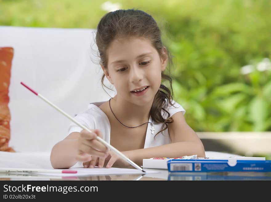 Portrait of nice little girl getting busy  in summer environment. Portrait of nice little girl getting busy  in summer environment