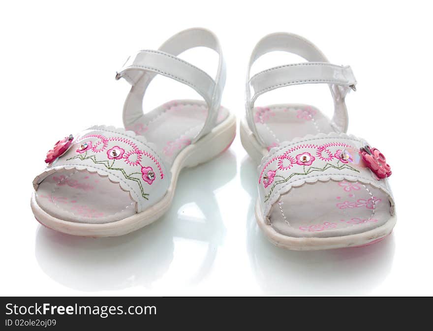 Children's barefoot persons, on a white background, it is isolated. Children's barefoot persons, on a white background, it is isolated.