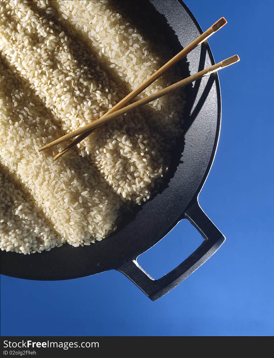 Variety of rice on wok