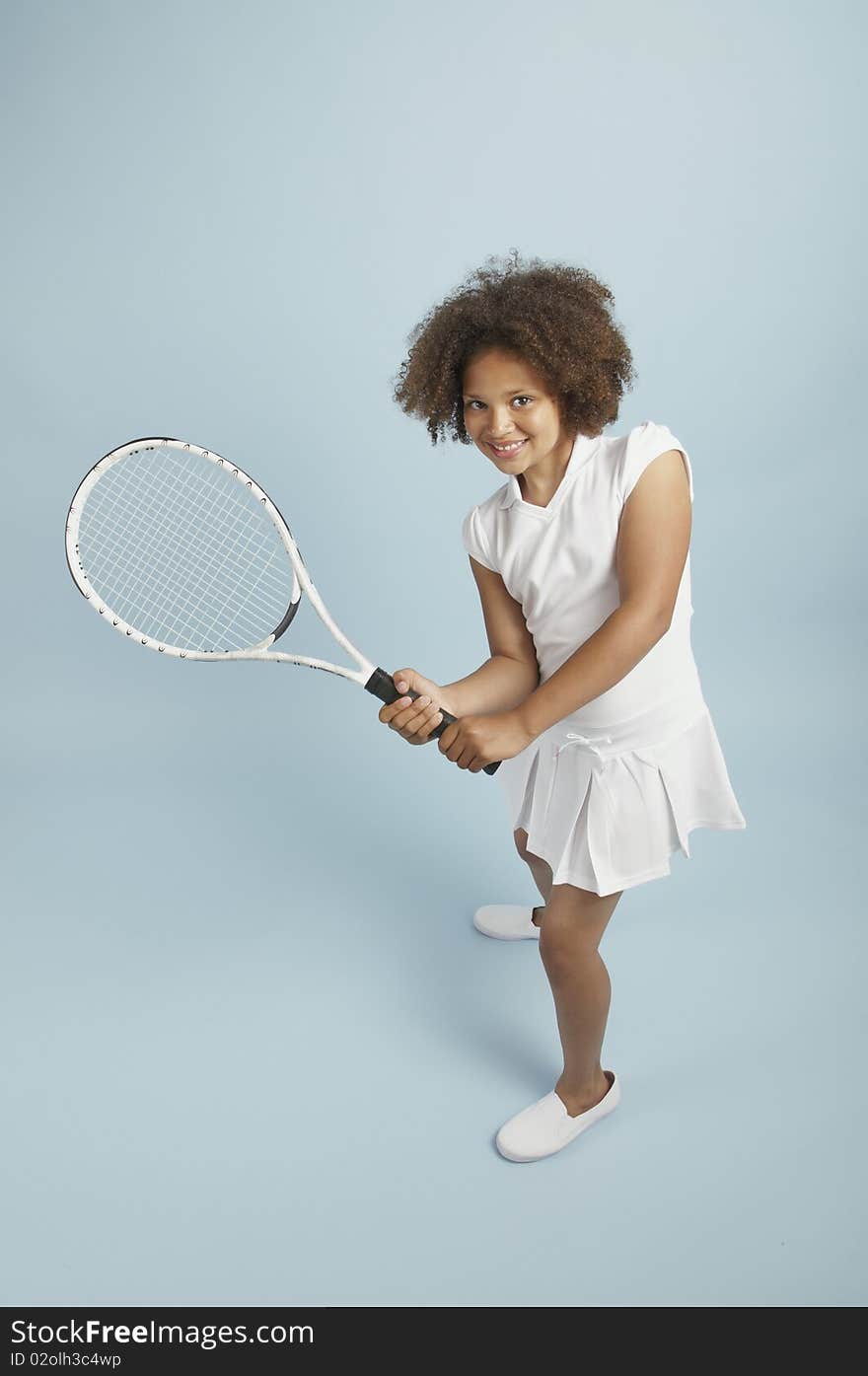 Mixed race young tennis girl ready to play. Mixed race young tennis girl ready to play