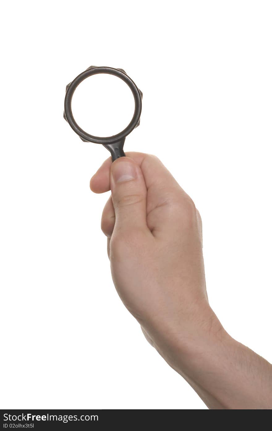 Well shaped hand with a magnifying glass