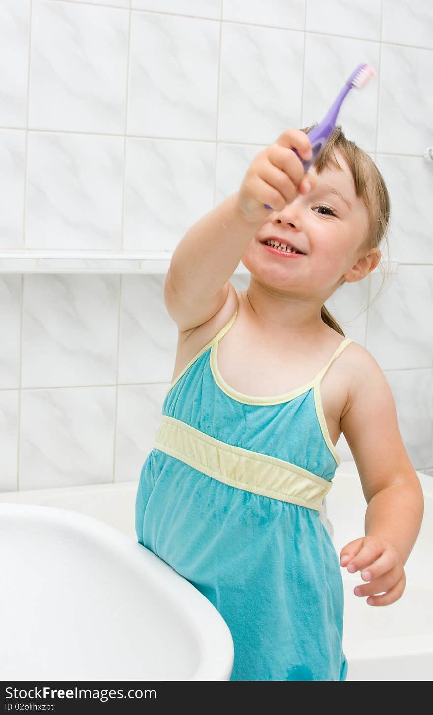 Happy little girl in toilet. Happy little girl in toilet