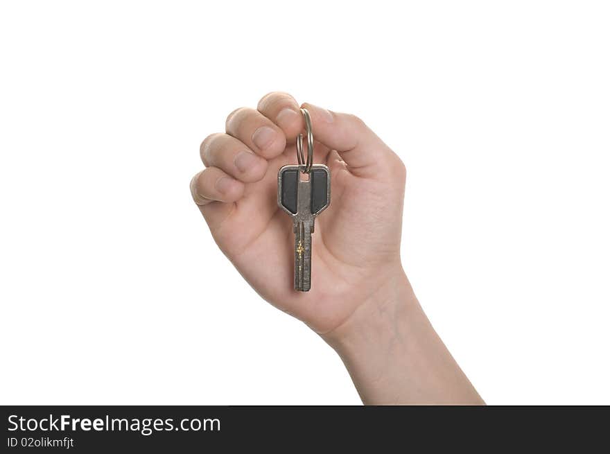 Business man hand with a key isolated over white