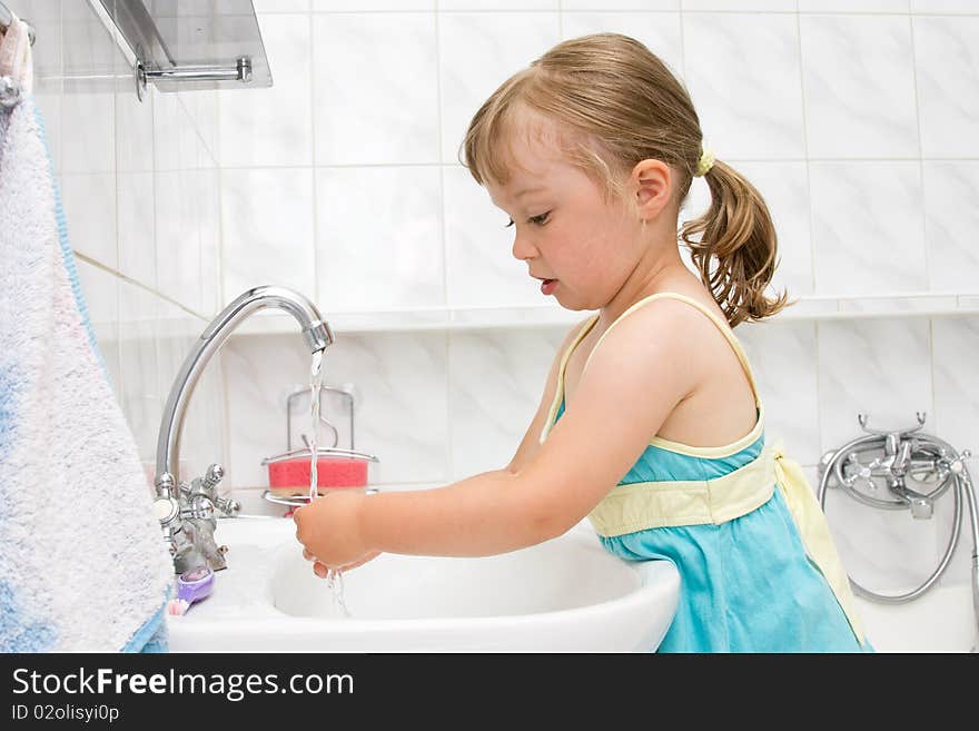 Little girl in bathroom