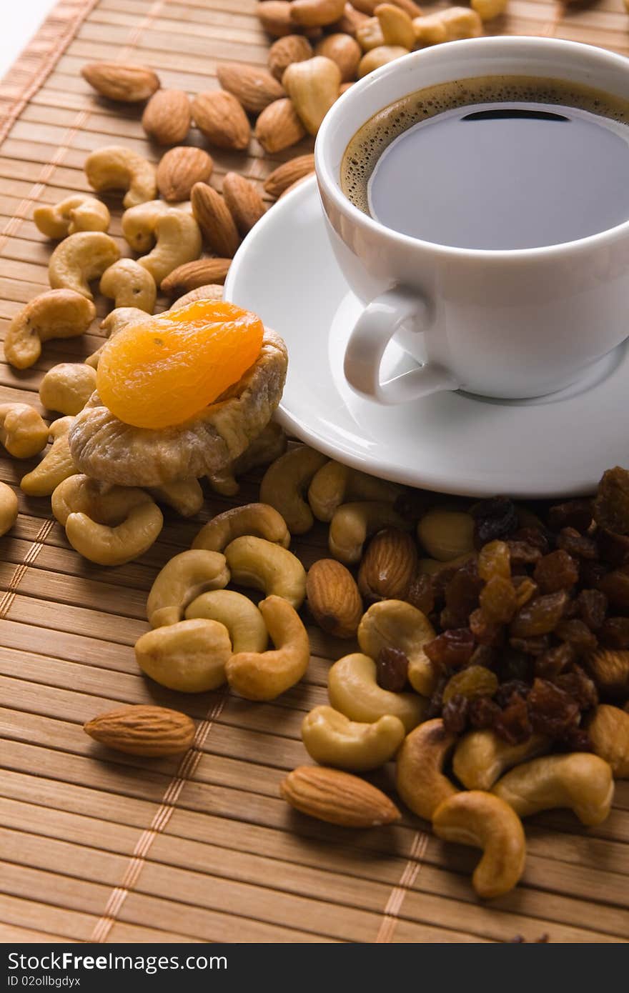 Coffee with nuts, fig and dried apricots