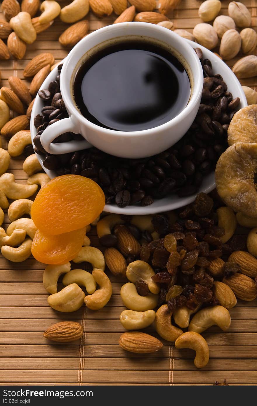 Coffee with nuts, fig and dried apricots