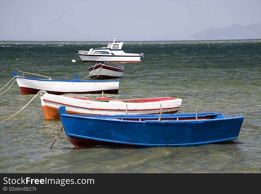 Five boats in the port