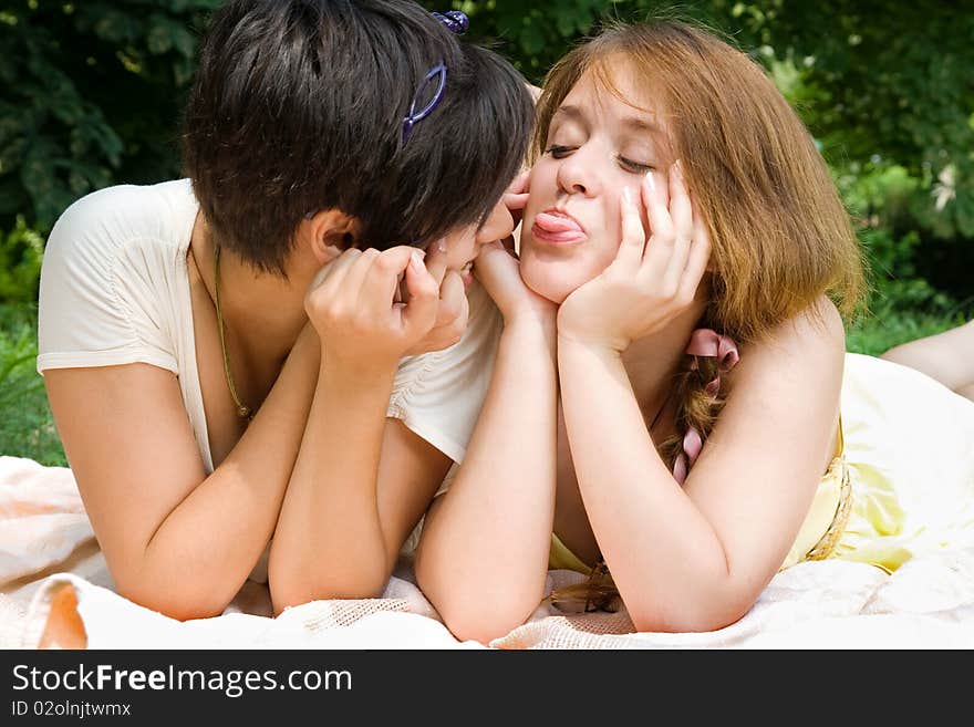 Couple of girls enjoying their weekend on fresh air outdoors. Couple of girls enjoying their weekend on fresh air outdoors