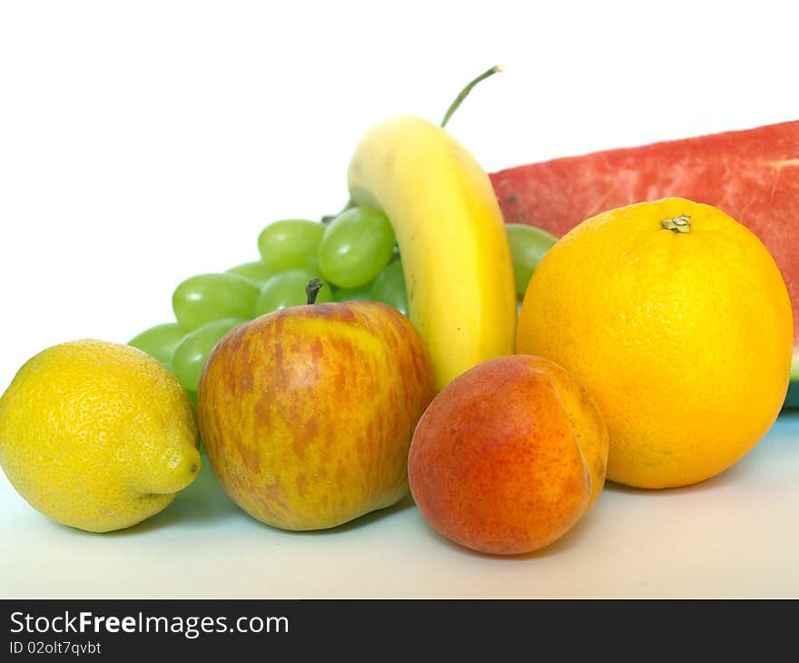 Various fruits on white background