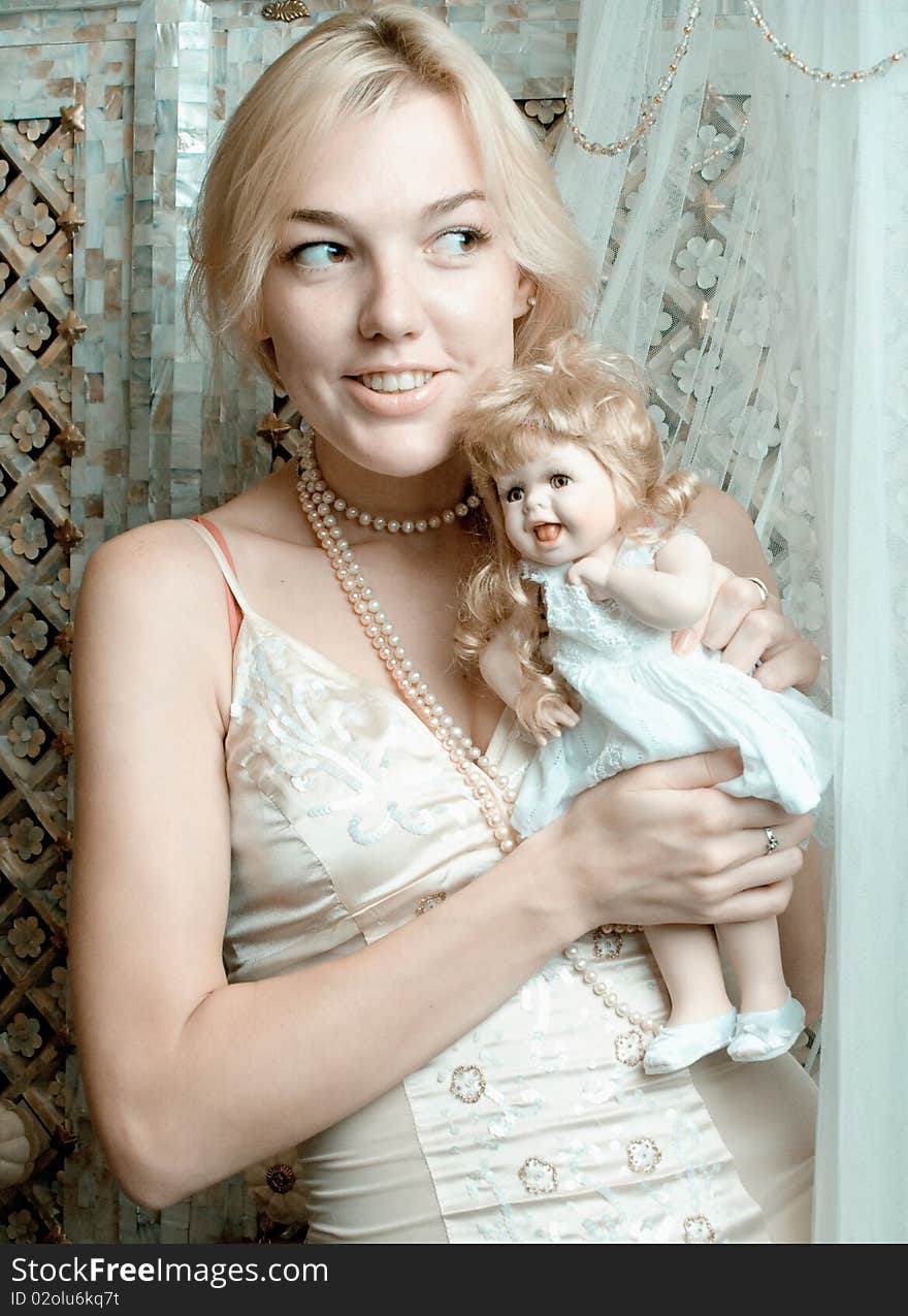 The Blonde With A Doll3