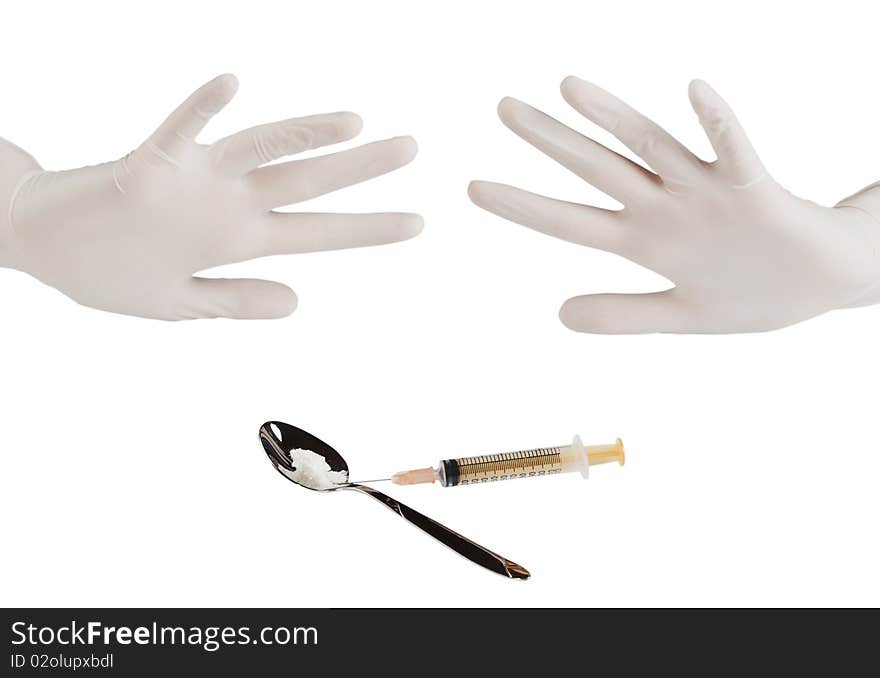 Hands of the person in surgical gloves, syringe, spoon with a white powder isolated on a white background. Hands of the person in surgical gloves, syringe, spoon with a white powder isolated on a white background