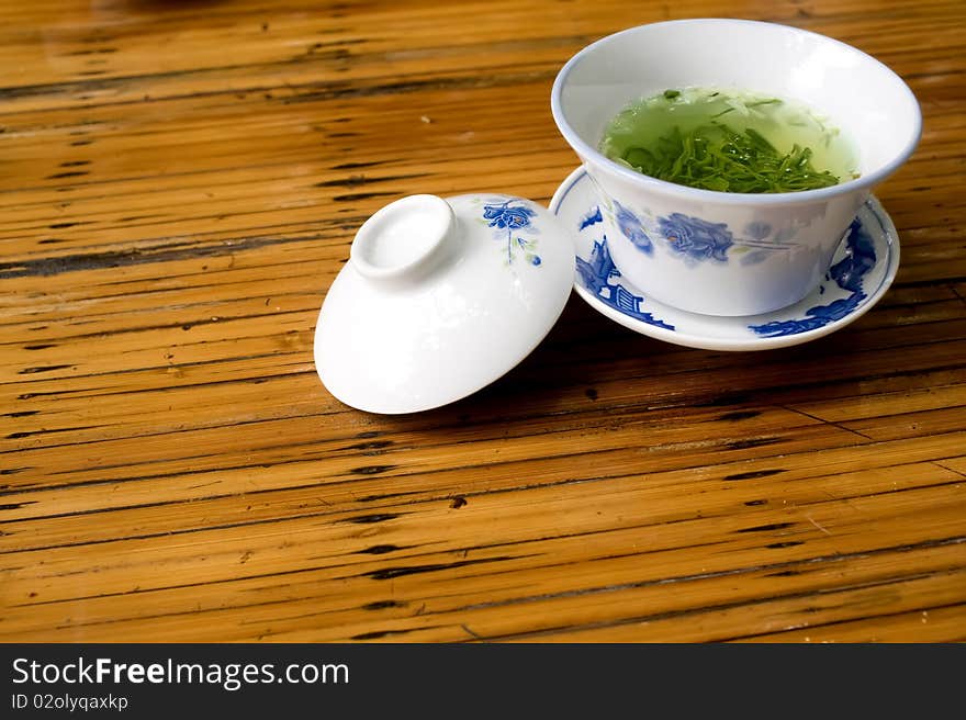 Chinese teacup and abstract table. Chinese teacup and abstract table