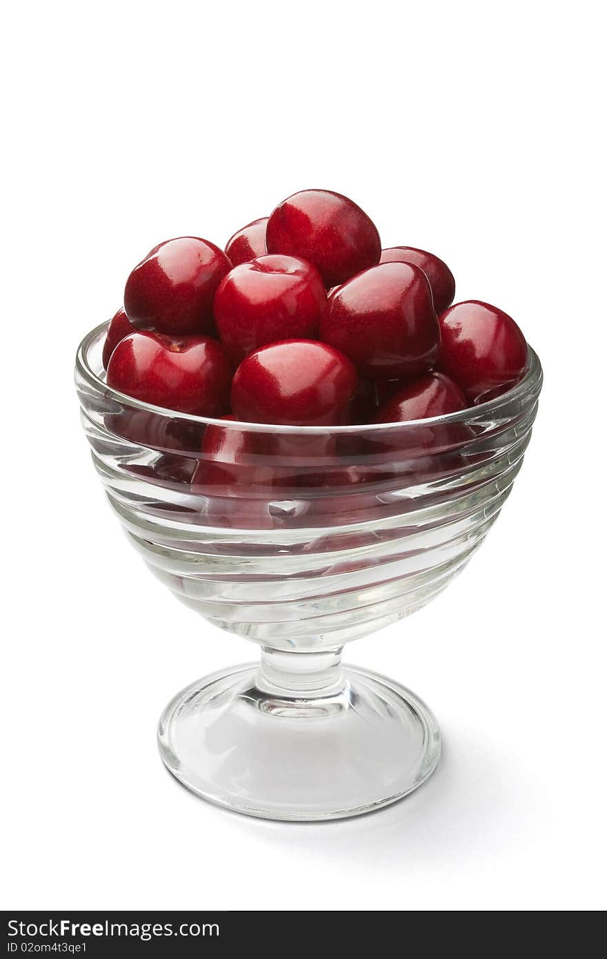 Cherries in a bowl isolated on a white