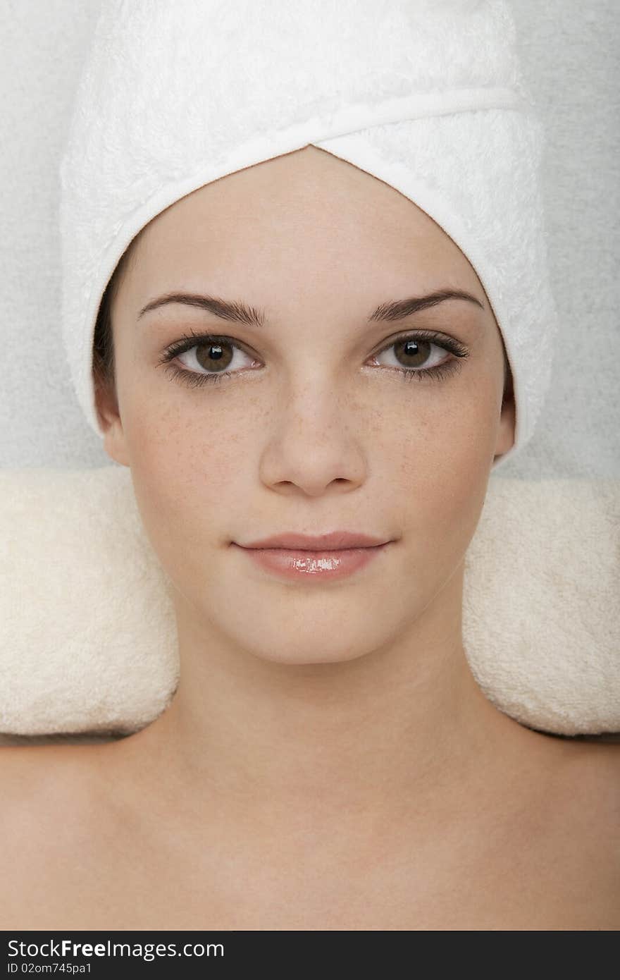 Young woman relaxing at beauty spa