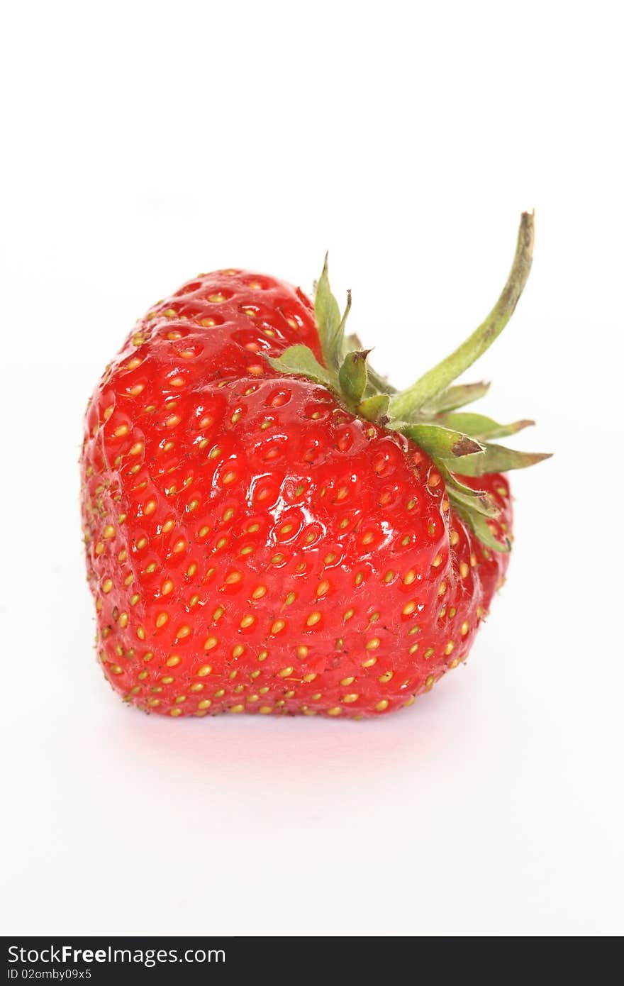 Closeup of fresh strawberry isolated on white background