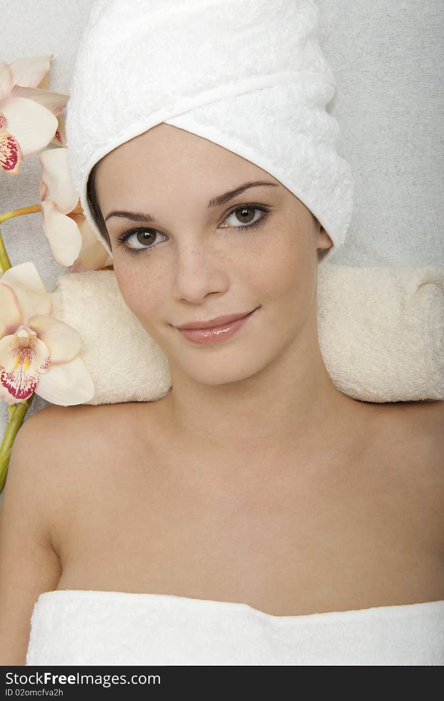 Young woman relaxing at beauty spa