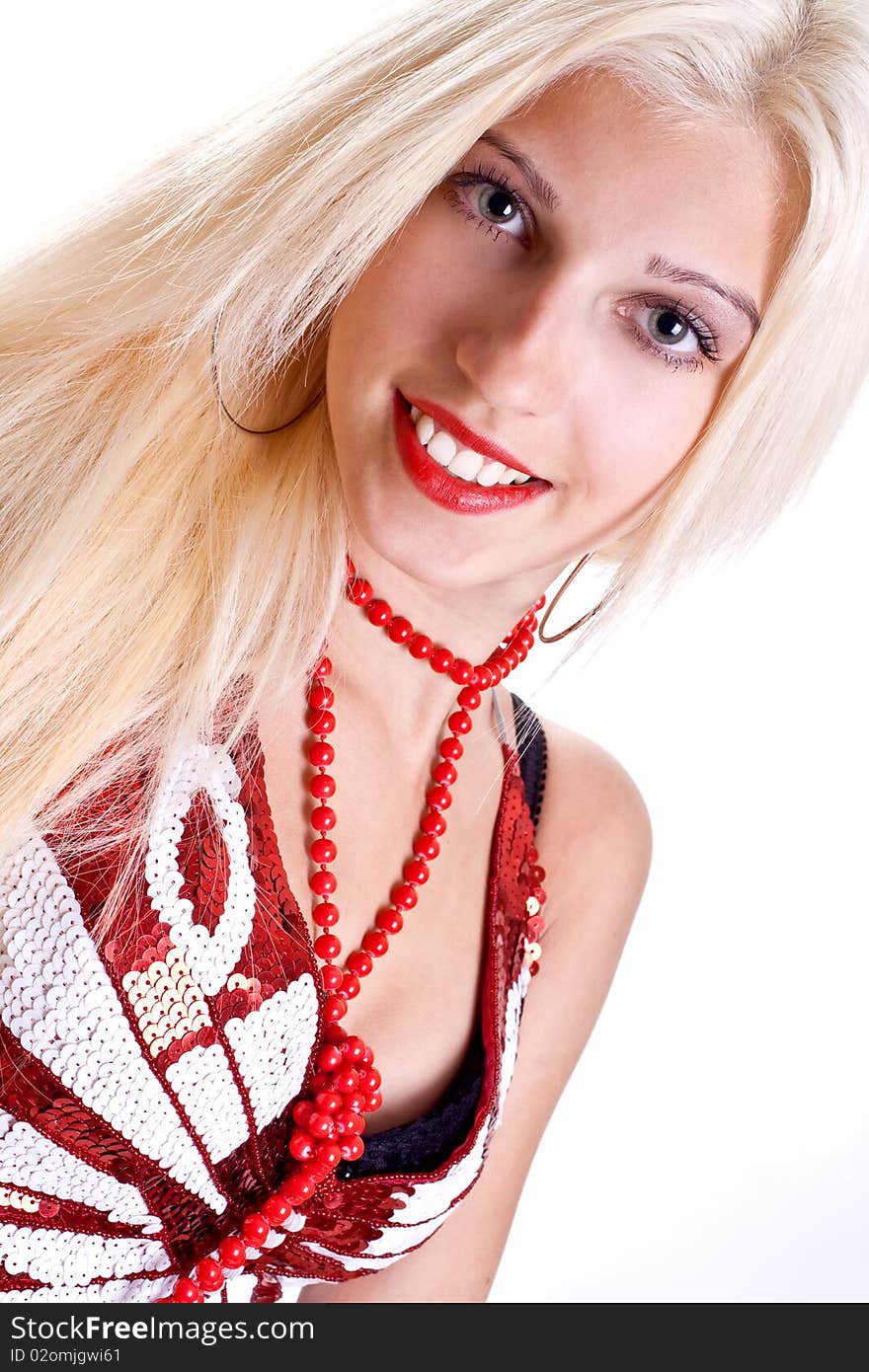 Woman in shirt with red beads posing on a white background