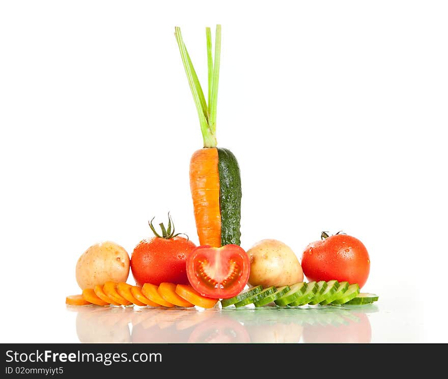 Carrot and cucumber slices, studio shot