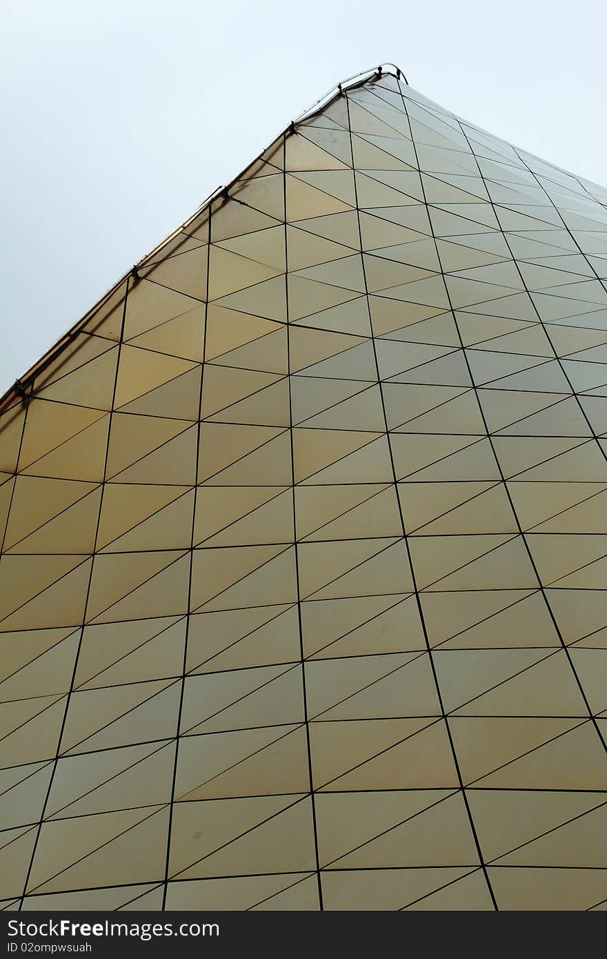 Golden metal roof of a mordern building. Golden metal roof of a mordern building