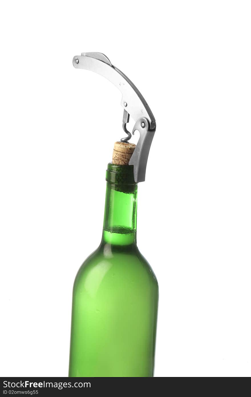 Opening a white wine bottle with a corkscrew. Opening a white wine bottle with a corkscrew