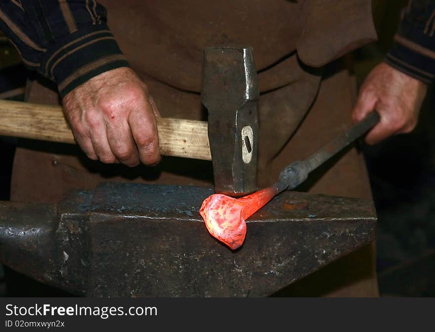 Hands of the working smith. Hands of the working smith