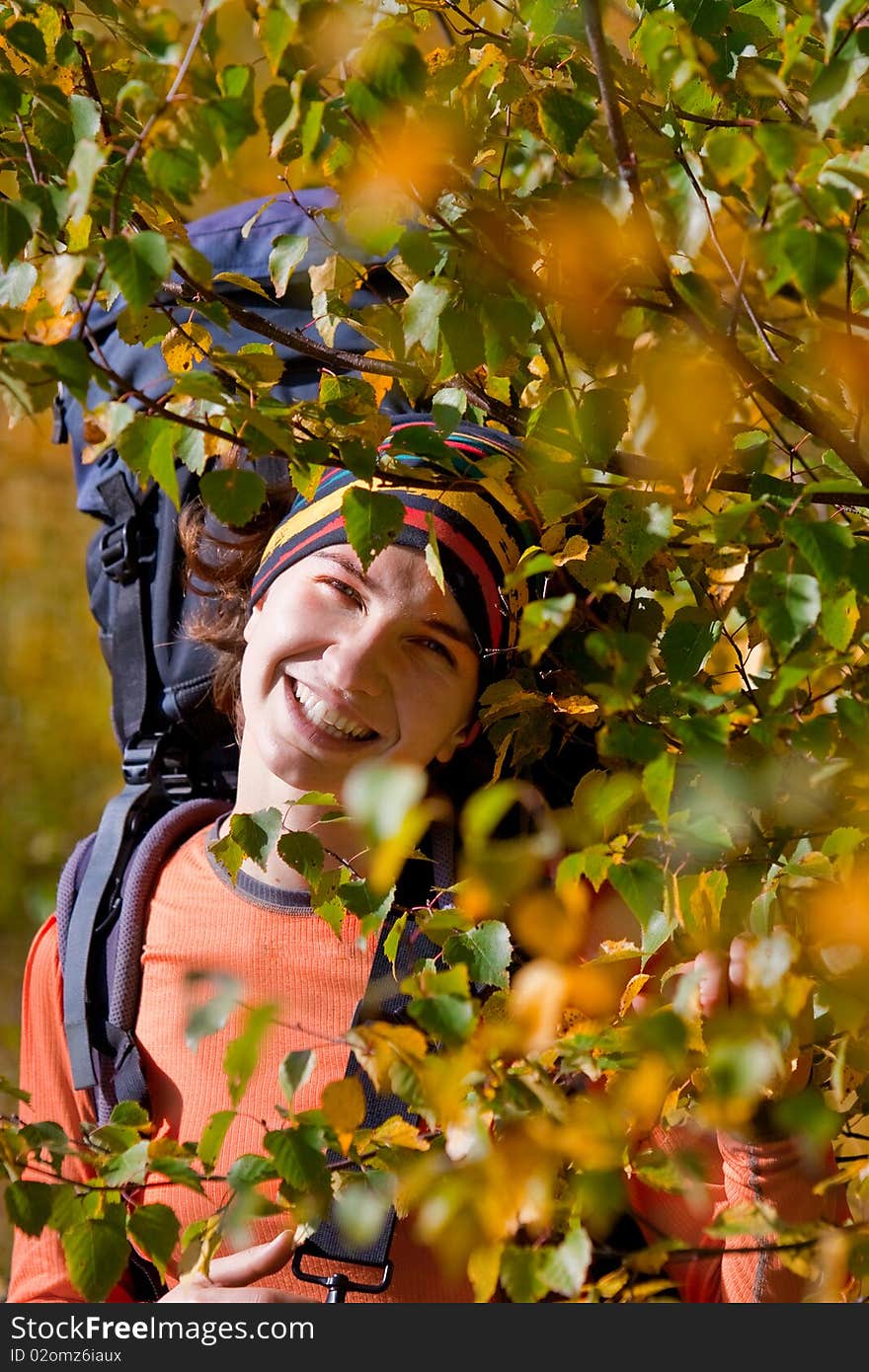 Hiker girl in autumn forest. Hiker girl in autumn forest