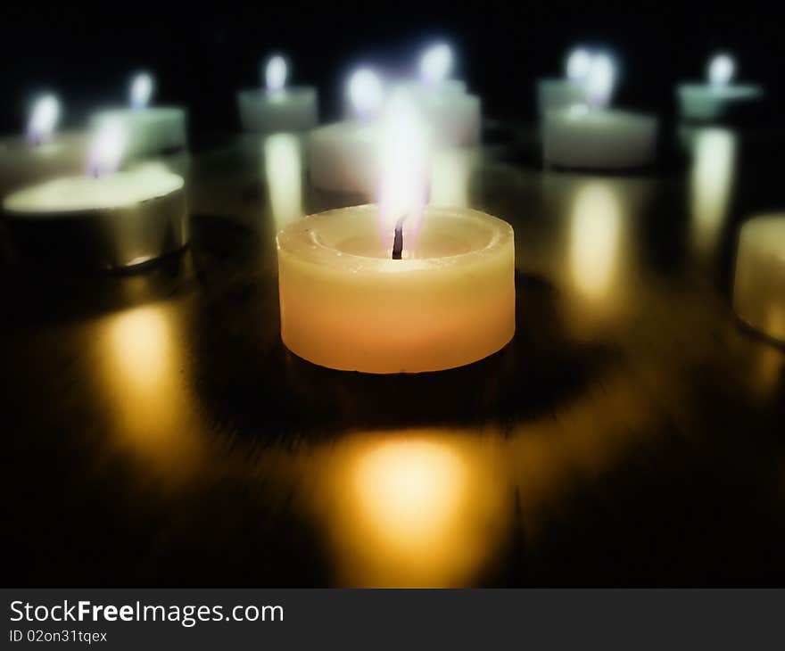 nice image of burning candles in the dark