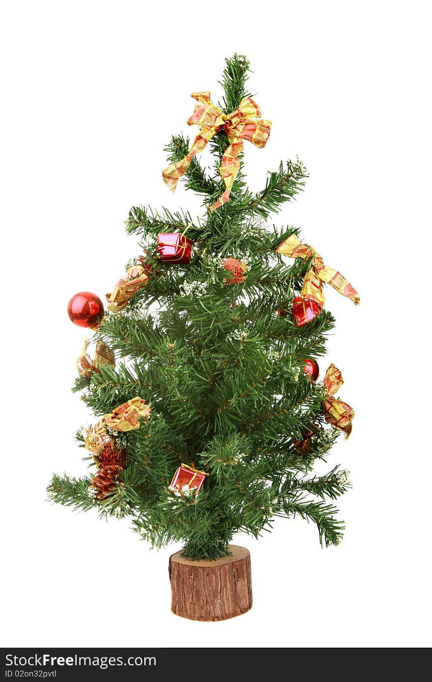 Green fur-tree with toys on a white background