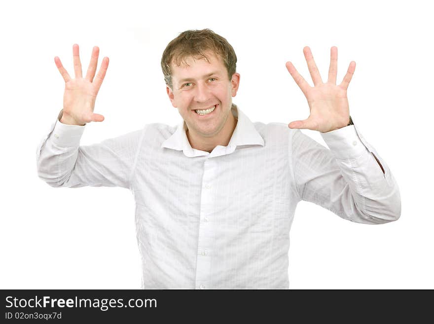 The young man smiles on a white background