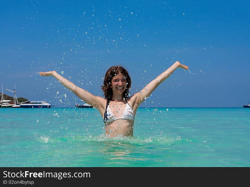 Girl with long hair playing in the sea. Girl with long hair playing in the sea