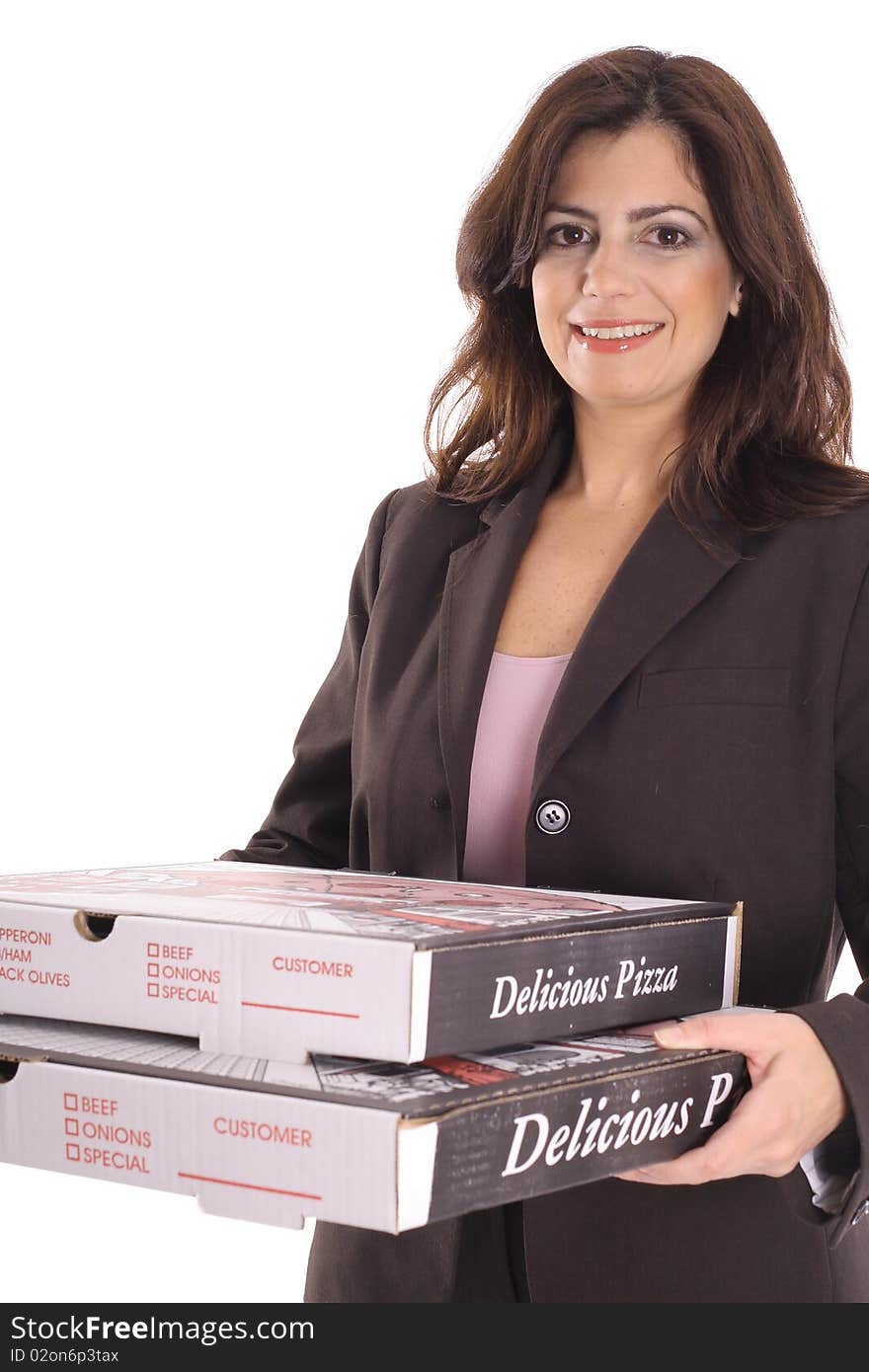 Happy woman in business suit carrying pizzas