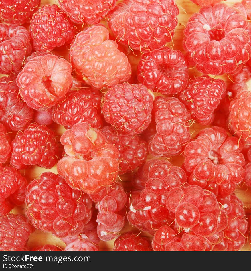 Raspberries as a background and texture