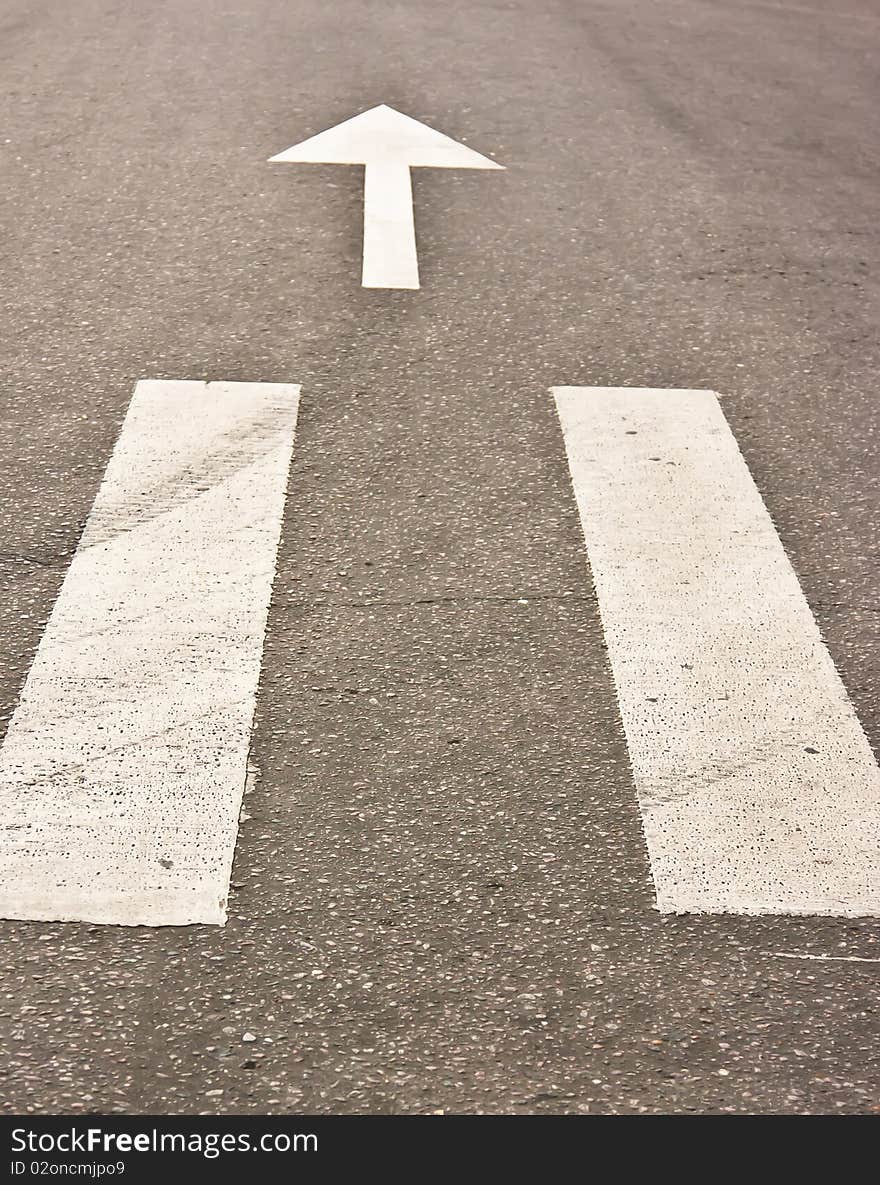 Pedestrian crossing on road at day