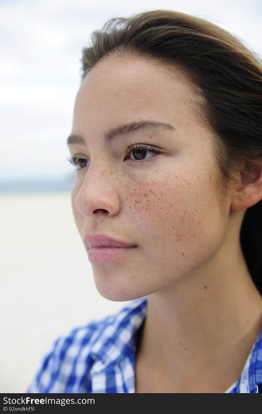 Portrait of a beautiful woman at the sea. Portrait of a beautiful woman at the sea