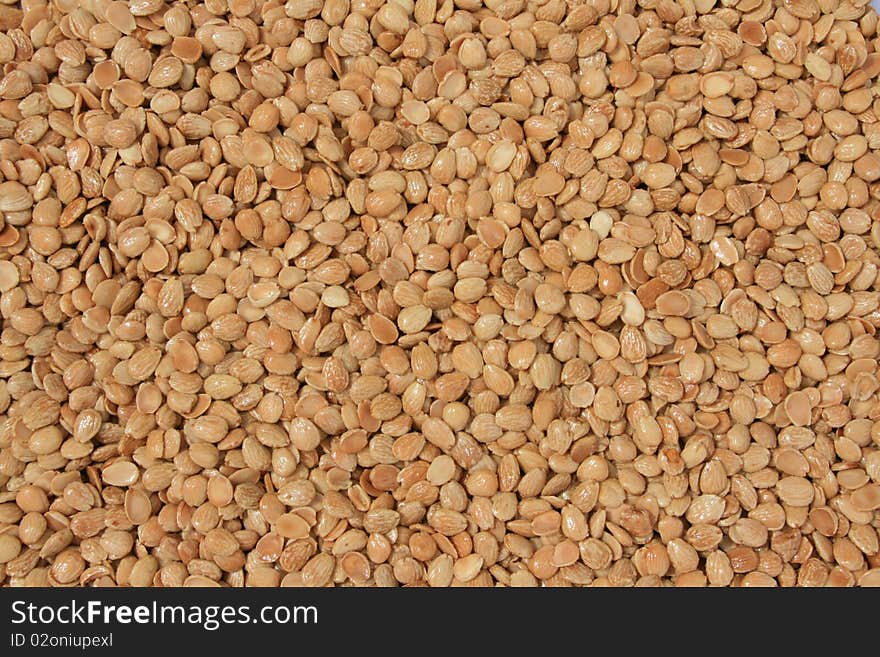 Background of salted and roasted almonds. Background of salted and roasted almonds