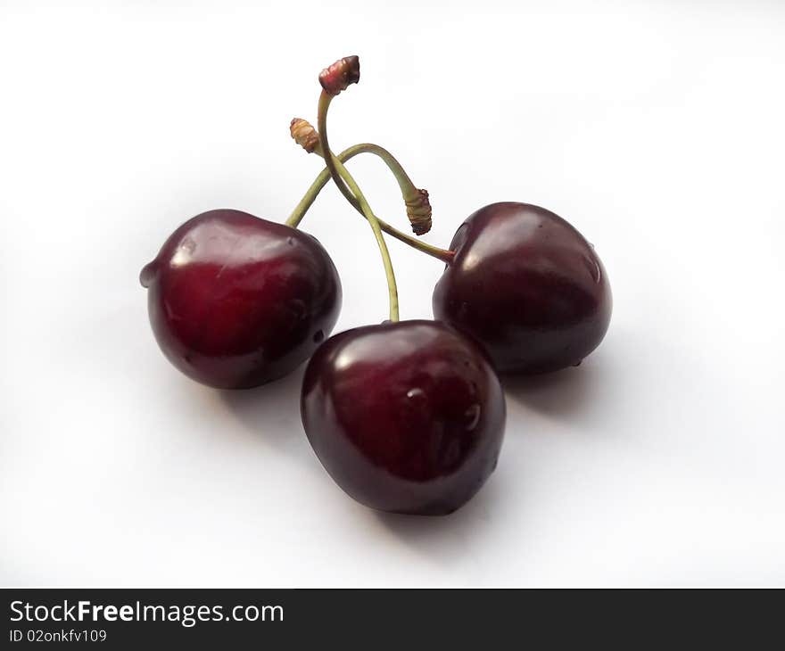 Three berries on a white background. Three berries on a white background