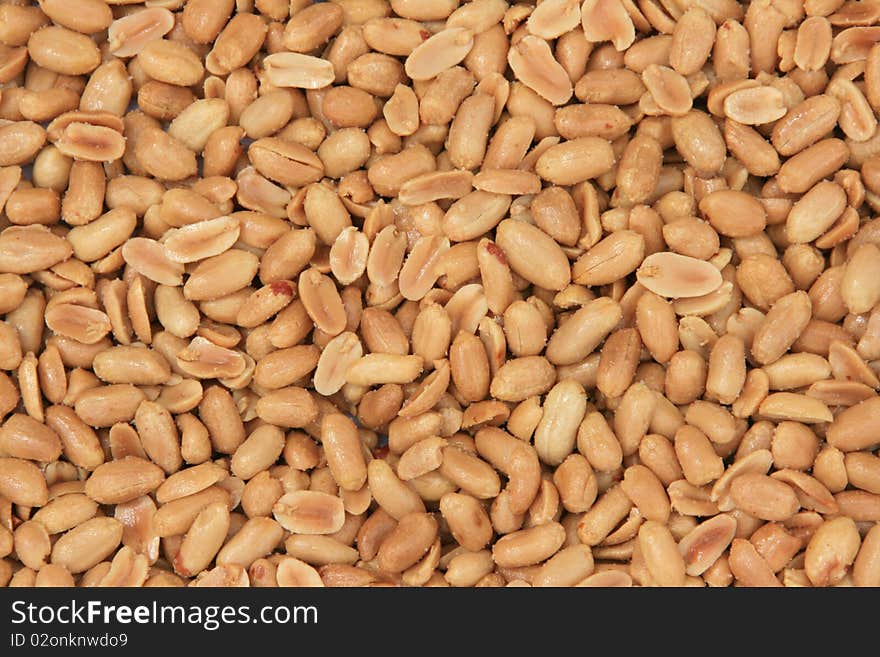 Background of salted and  toasted peanuts. Background of salted and  toasted peanuts