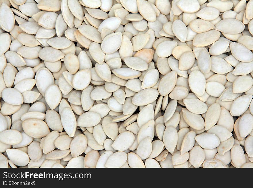 Background of white pumpkin seeds. Background of white pumpkin seeds