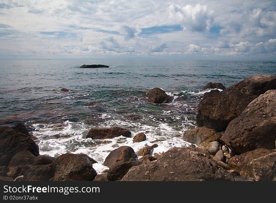 Black Sea. Sea surf. Kind of a wave crashed against the rocks.