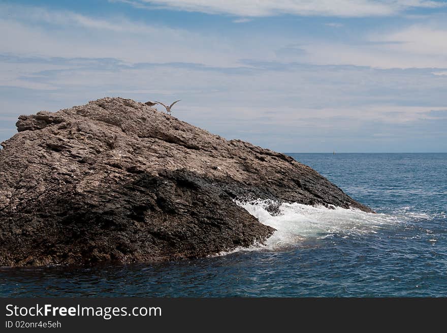 Black Sea. Sea surf. Kind of a wave crashed against the rocks.