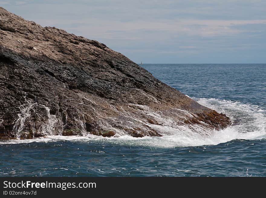 Black Sea. Sea surf. Kind of a wave crashed against the rocks.